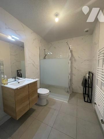 Appartement T3 en duplex avec jardin et 2 places de parking