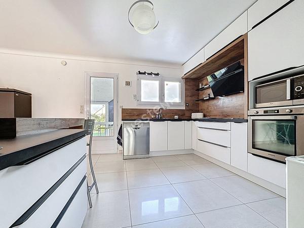 Maison familiale à vendre à Ancenis - 5 chambres, véranda, grand garage et jardin