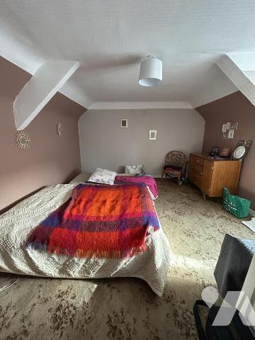 Maison en pierres avec terrain constructible