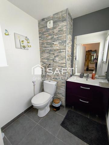 Maison récente 4 chambres et jardin.