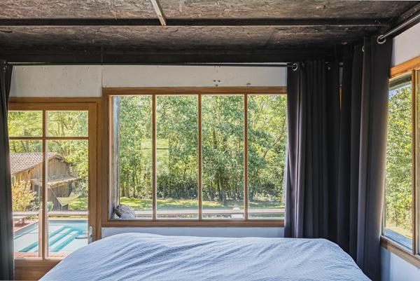 Maison d’Architecte inversée avec vue canopée