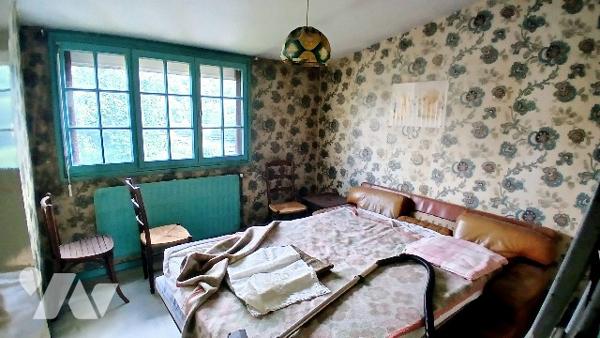 PAVILLON JUMELE D'UN COTE