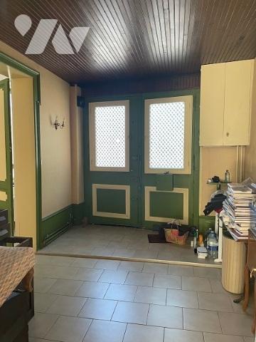 UNE MAISON A USAGE D'HABITATION