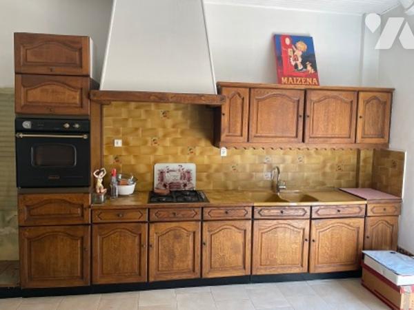 UNE MAISON A USAGE D'HABITATION