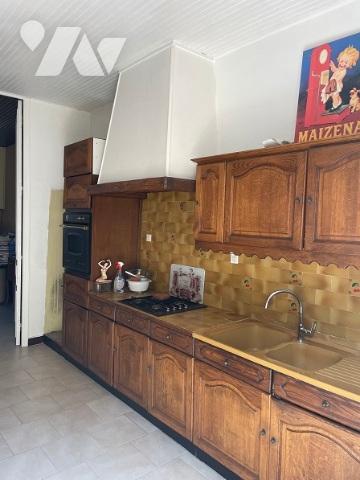 UNE MAISON A USAGE D'HABITATION