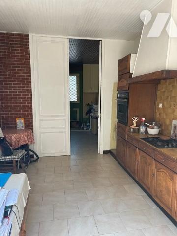 UNE MAISON A USAGE D'HABITATION