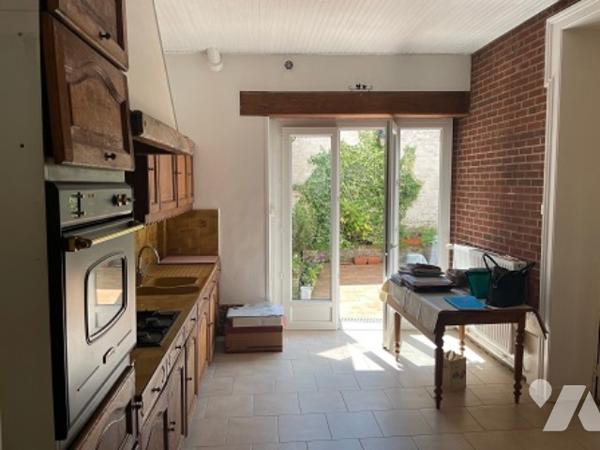 UNE MAISON A USAGE D'HABITATION