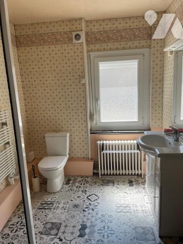 UNE MAISON A USAGE D'HABITATION