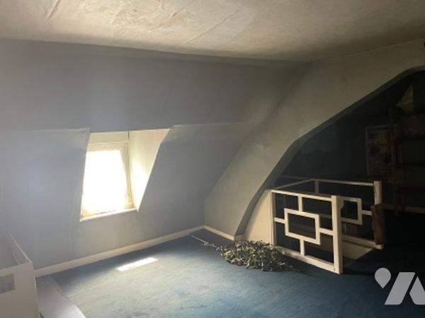 UNE MAISON A USAGE D'HABITATION