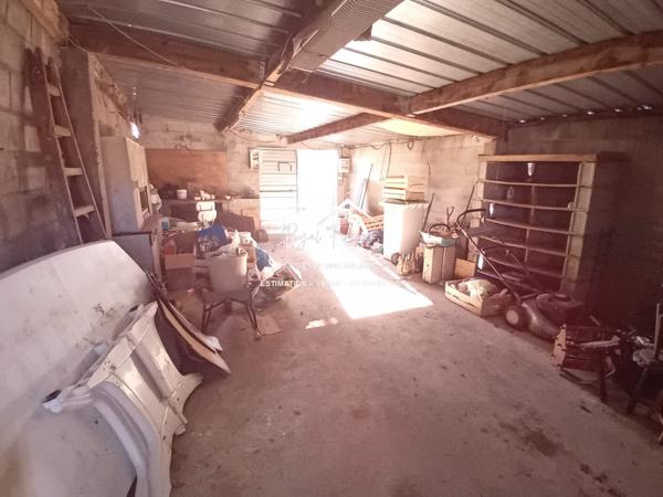 RARE sur cette commune ! Agréable terrain et un garage de 40 m2