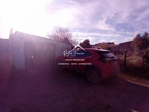 RARE sur cette commune ! Agréable terrain et un garage de 40 m2