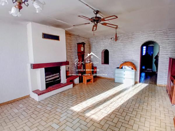 RARE sur cette commune ! Agréable terrain et un garage de 40 m2