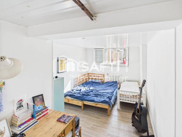 Bel appartement 4 piéces, jardin, véranda.