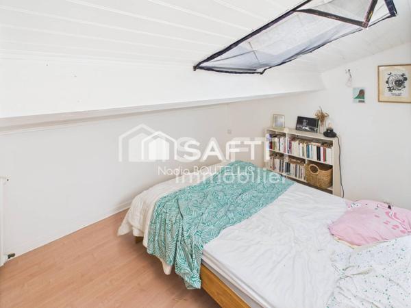 Bel appartement 4 piéces, jardin, véranda.