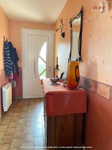 Plain-pied calme et lumineux avec grand sous-sol et jardin clos  proche l'Aigle