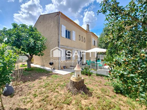 Maison 4 faces de 122 m² habitables avec garage et annexes