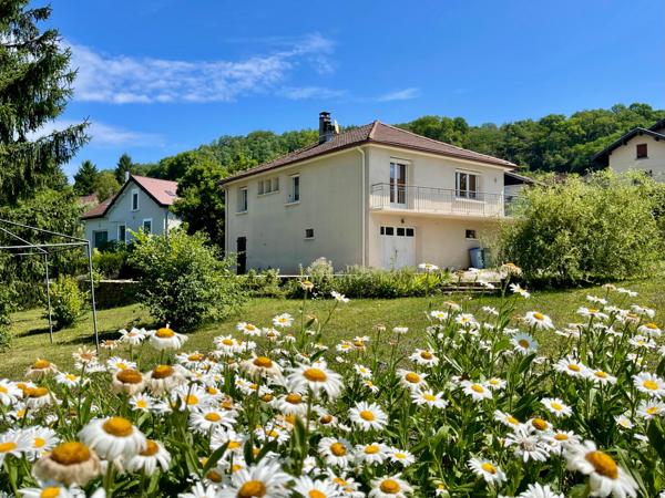Maison 5 chambres avec beau terrain aux portes de Lons le Saunier
