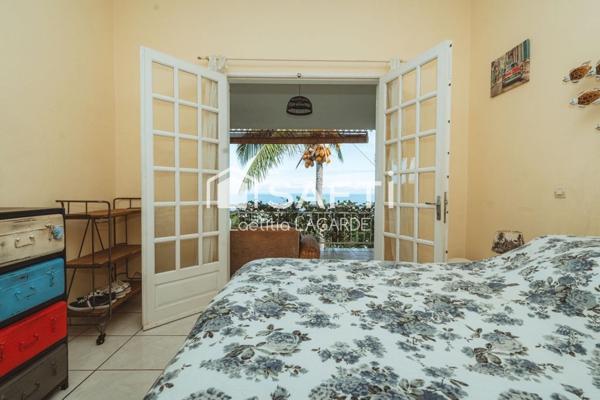 Villa de charme avec vue mer à 180° et jardin tropical – Saint-Leu
