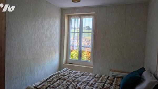 Maison ancienne à rénover de 95 m² + cave + grange agricole de 256 m² environ 