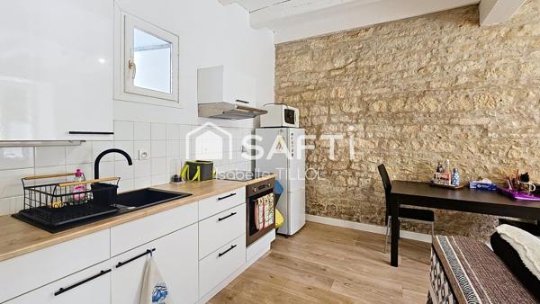 Appartement T2 immeuble de caractère