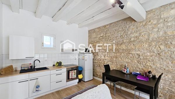 Appartement T2 immeuble de caractère