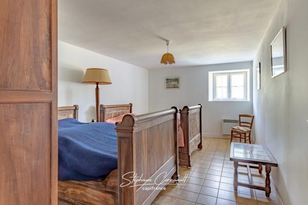 Maison en pierre de 157m² avec 6,3ha de bois et prairies