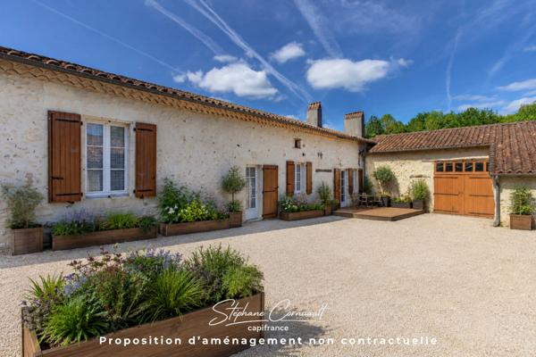Maison en pierre de 157m² avec 6,3ha de bois et prairies