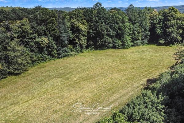 Maison en pierre de 157m² avec 6,3ha de bois et prairies