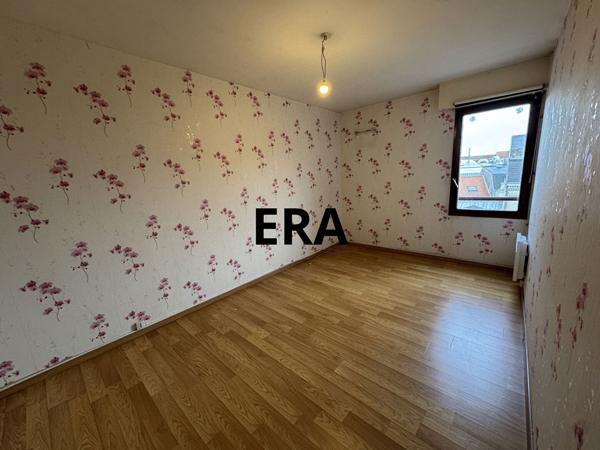Appartement de 81m2, 2 chambres avec balcon / garage + place de stationnement