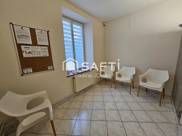 Immeuble à rénover avec 4 logements et un local professionnel (dentiste)