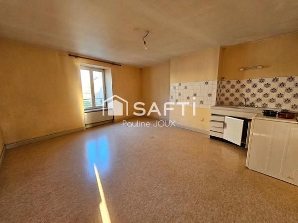 Immeuble à rénover avec 4 logements et un local professionnel (dentiste)