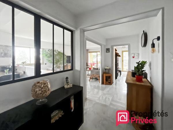 Appartement 3 pièces traversant avec terrasses, garage et cave