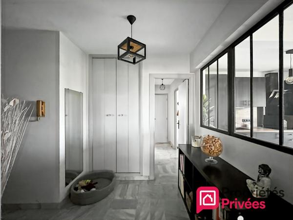Appartement 3 pièces traversant avec terrasses, garage et cave
