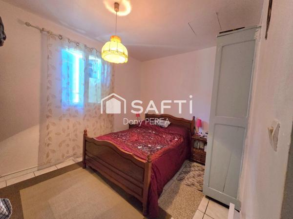 Ensemble immobilier de cinq habitations.