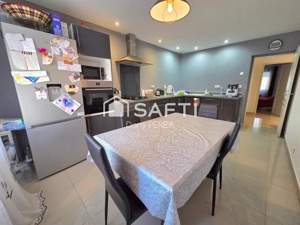 Ensemble immobilier de cinq habitations.