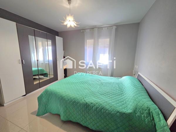 Ensemble immobilier de cinq habitations.