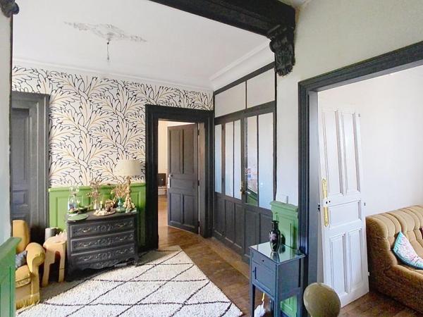 Vivre en coeur de ville avec le privilège d'un jardin arboré et calme ?