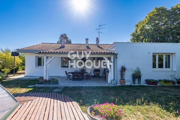 Maison plain-pied, piscine et terrain arboré de 1 645 m² — Chavanoz