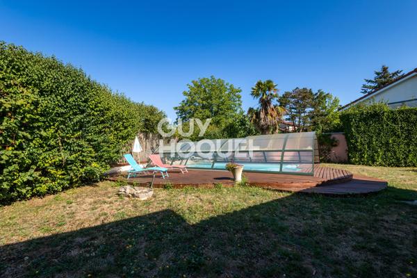 Maison plain-pied, piscine et terrain arboré de 1 645 m² — Chavanoz