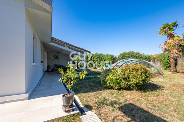 Maison plain-pied, piscine et terrain arboré de 1 645 m² — Chavanoz