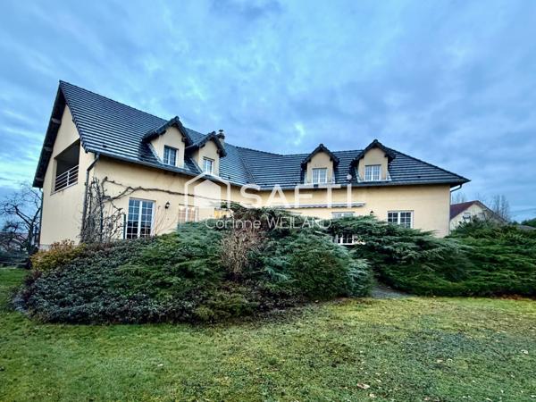 Magnifique maison d'architecte, terrain 16 ares, 6 chambres, 4 salles d'eau, bureaux, sous-sol de 413 m2 dont garage de 312 m2 + garage 2 voitures au RDC