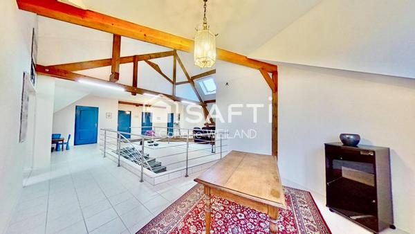 Magnifique maison d'architecte, terrain 16 ares, 6 chambres, 4 salles d'eau, bureaux, sous-sol de 413 m2 dont garage de 312 m2 + garage 2 voitures au RDC