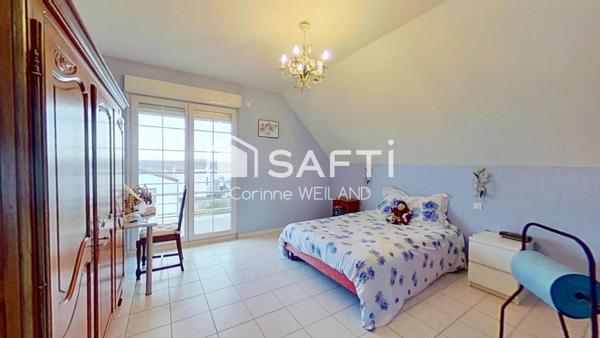 Magnifique maison d'architecte, terrain 16 ares, 6 chambres, 4 salles d'eau, bureaux, sous-sol de 413 m2 dont garage de 312 m2 + garage 2 voitures au RDC