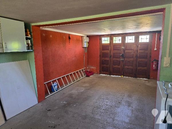 Maison individuelle avec jardin et garage, proche du centre ville et collège.