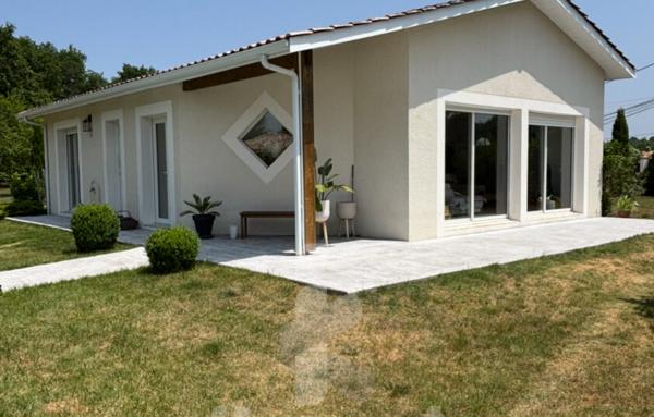 Magnifique maison de 145m2 avec grande piscine et dépendance sur un terrain arboré de 2740m2 proche du centre-