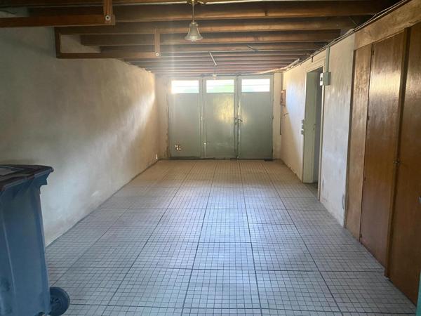 Maison de ville avec garage et jardin