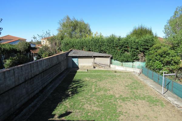 Maison de ville avec garage et jardin