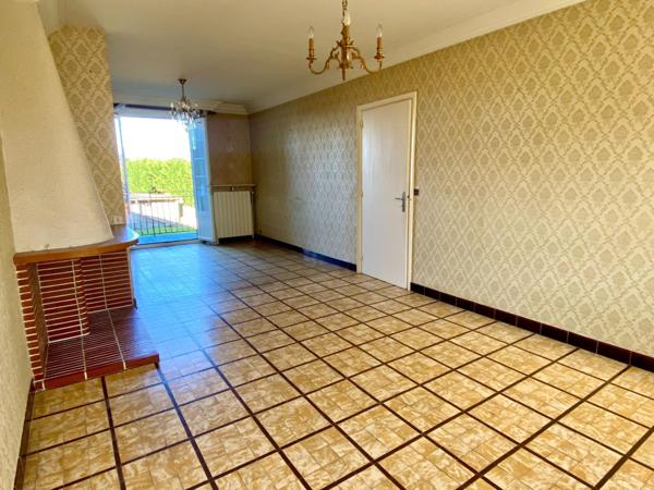 Maison de ville avec garage et jardin