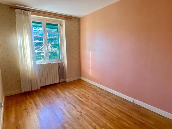 Maison de ville avec garage et jardin