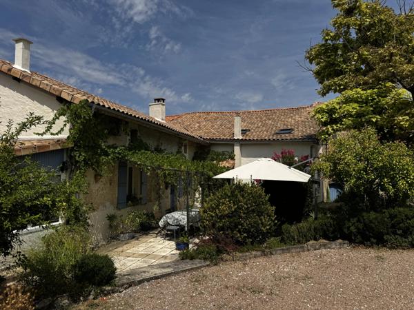 Maison de caractère de 3/4 chambres avec vue sur la campagne et potentiel de revenus